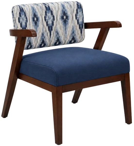 A mid-century modern accent chair with a dark brown wooden frame, a navy blue upholstered seat cushion, and a blue and white ikat patterned backrest cushion, shown on a white background.