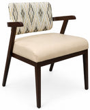 A modern accent chair with a dark brown wooden frame, a cream upholstered seat cushion, and a patterned beige, gray, and green ikat-style backrest cushion, shown on a white background.