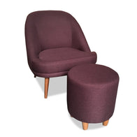An upholstered lounge chair with a solid timber frame and legs, paired with a matching round ottoman.